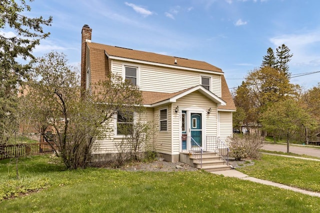 4031 Regent St, Duluth, MN 55804 - colonial inspired home with a chimney and a shingled roof