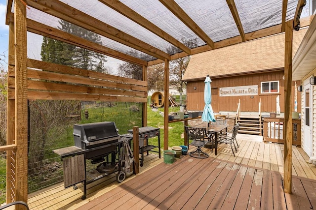 4031 Regent St, Duluth, MN 55804 - wooden deck featuring outdoor dining area and area for grilling