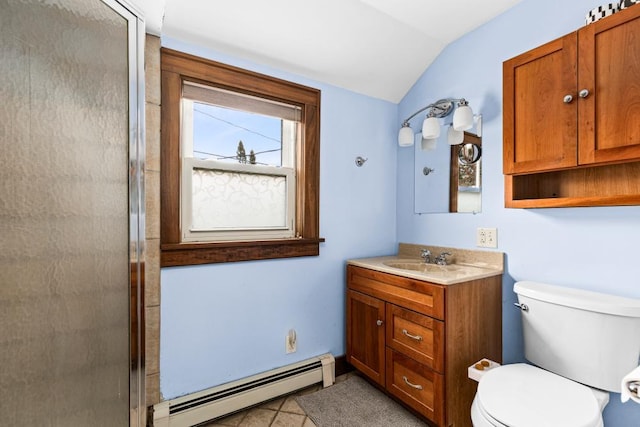 4031 Regent St, Duluth, MN 55804 - full bathroom featuring baseboard heating, vaulted ceiling, vanity, toilet, and a shower with door