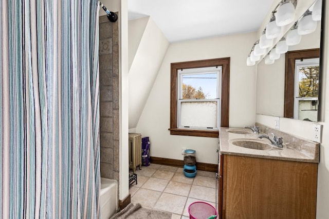 4031 Regent St, Duluth, MN 55804 - full bathroom featuring double vanity, tile patterned flooring, shower / tub combo with curtain, baseboards, and radiator