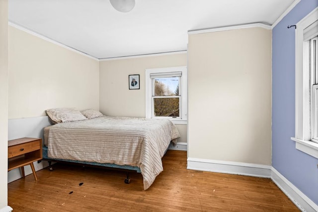 4031 Regent St, Duluth, MN 55804 - bedroom with ornamental molding, wood finished floors, and baseboards