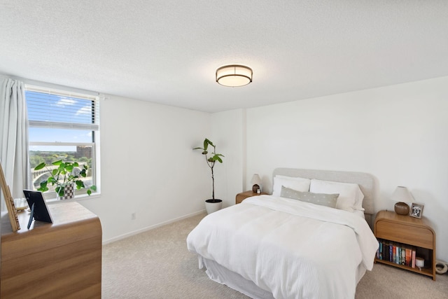 401 1st St Unit 922, Minneapolis, MN 55401 - carpeted bedroom with a textured ceiling and baseboards