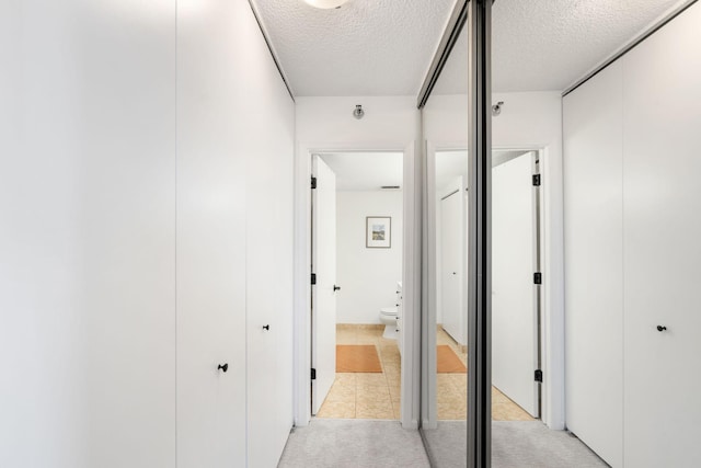 401 1st St Unit 922, Minneapolis, MN 55401 - hall with a textured ceiling and light colored carpet