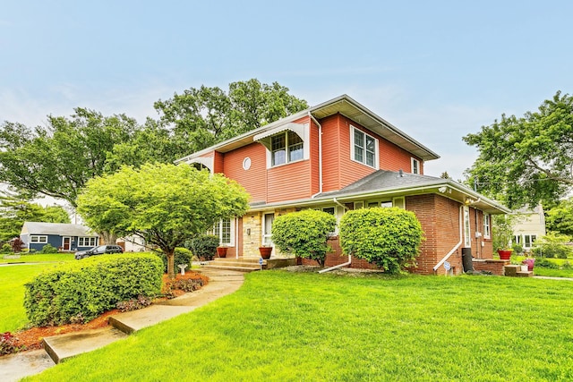 2816 29th Ave NE, Saint Anthony, MN 55418 - view of front of house with a front lawn and brick siding