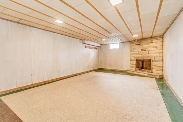 2816 29th Ave NE, Saint Anthony, MN 55418 - basement with a stone fireplace and wooden walls
