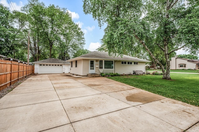 5404 Welcome Ave N, Crystal, MN 55429 - single story home featuring an outbuilding, a detached garage, entry steps, and roof with shingles
