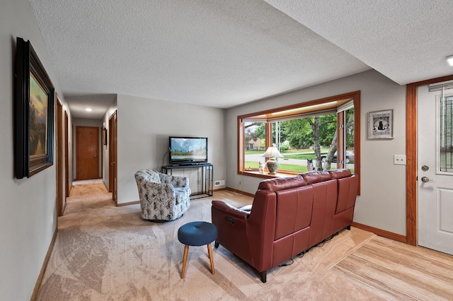5404 Welcome Ave N, Crystal, MN 55429 - living room featuring baseboards, light carpet, and a textured ceiling