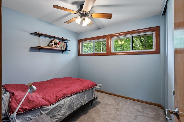 5404 Welcome Ave N, Crystal, MN 55429 - bedroom with carpet floors, baseboards, and ceiling fan