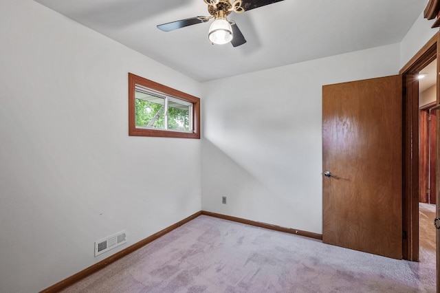 5404 Welcome Ave N, Crystal, MN 55429 - unfurnished bedroom featuring carpet, baseboards, and a ceiling fan