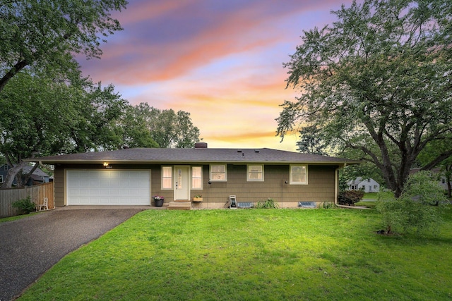 4600 3rd St NE, Fridley, MN 55421 - ranch-style house featuring asphalt driveway, an attached garage, and a chimney