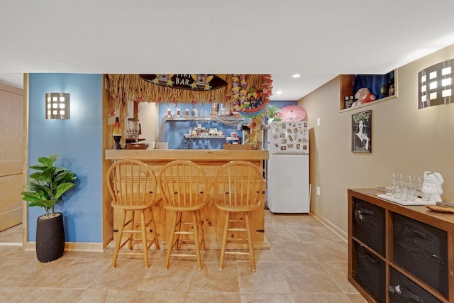 4600 3rd St NE, Fridley, MN 55421 - tiled dining room with bar area and baseboards