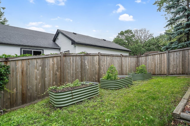 4600 3rd St NE, Fridley, MN 55421 - fenced backyard featuring a vegetable garden