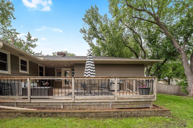 4600 3rd St NE, Fridley, MN 55421 - back of property with a deck and a chimney