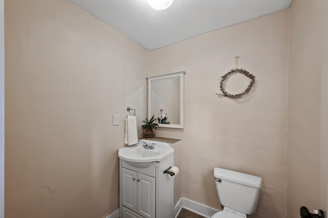 4312 Nokomis Ave, Minneapolis, MN 55406 - bathroom featuring vanity, toilet, and baseboards