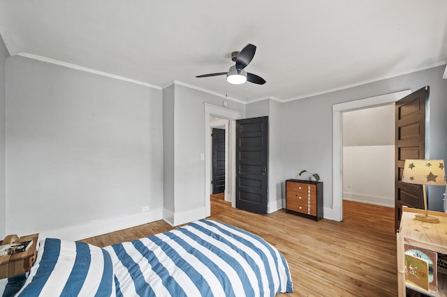 4312 Nokomis Ave, Minneapolis, MN 55406 - bedroom with wood finished floors, baseboards, crown molding, and ceiling fan