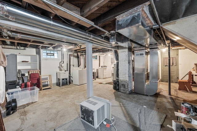 4312 Nokomis Ave, Minneapolis, MN 55406 - basement with independent washer and dryer, heating unit, and a sink