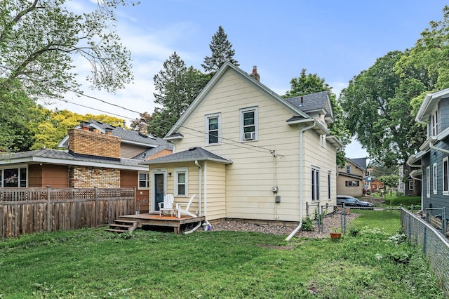 4312 Nokomis Ave, Minneapolis, MN 55406 - rear view of house featuring a wooden deck, a chimney, and roof with shingles