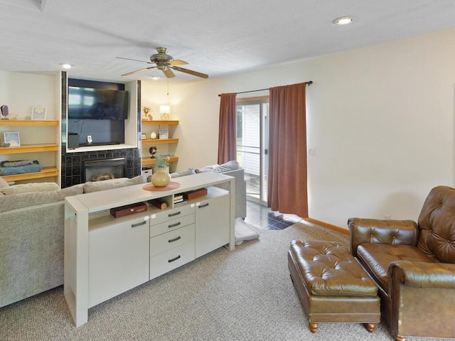 38609 Branch Ave, North Branch, MN 55056 - living area with a fireplace, light carpet, ceiling fan, recessed lighting, and baseboards