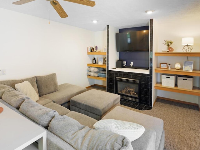 38609 Branch Ave, North Branch, MN 55056 - carpeted living room featuring a tile fireplace and ceiling fan