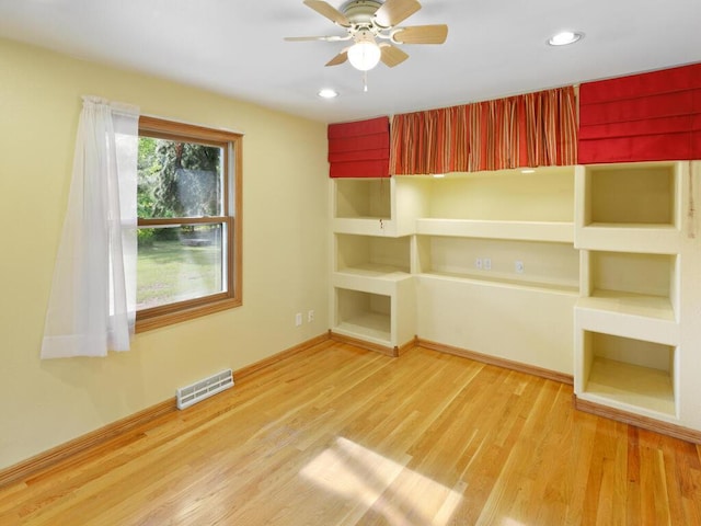 38609 Branch Ave, North Branch, MN 55056 - unfurnished bedroom with wood finished floors, recessed lighting, baseboards, and ceiling fan