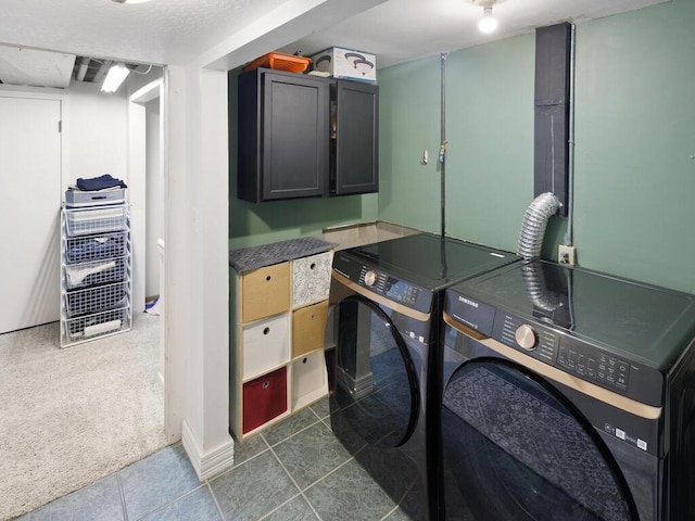 38609 Branch Ave, North Branch, MN 55056 - laundry room featuring cabinet space, washing machine and dryer, and tile patterned floors