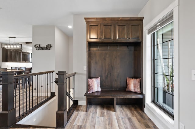 18885 Poppy St NW, Oak Grove, MN 55303 - mudroom featuring wood finished floors, recessed lighting, baseboards, and a chandelier