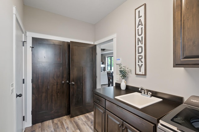 18885 Poppy St NW, Oak Grove, MN 55303 - bathroom with vanity and wood finished floors