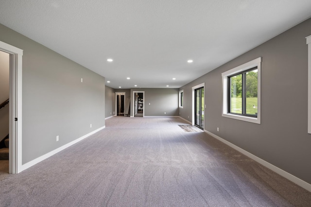 18885 Poppy St NW, Oak Grove, MN 55303 - empty room with light colored carpet, baseboards, and recessed lighting
