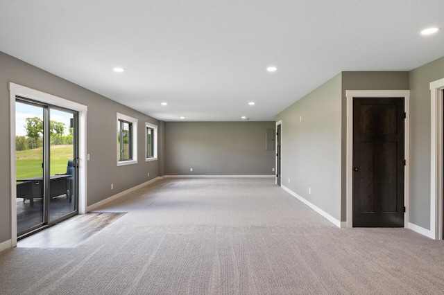 18885 Poppy St NW, Oak Grove, MN 55303 - empty room with carpet flooring, recessed lighting, and baseboards