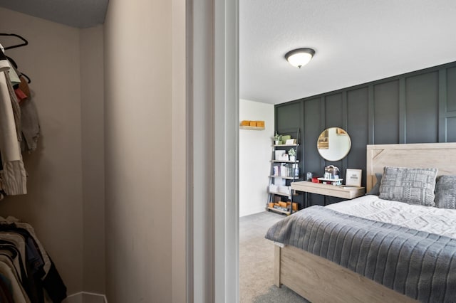 18885 Poppy St NW, Oak Grove, MN 55303 - carpeted bedroom featuring a decorative wall