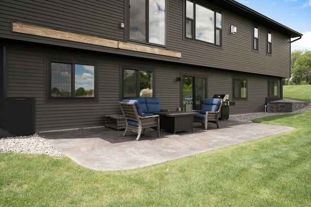 18885 Poppy St NW, Oak Grove, MN 55303 - rear view of house featuring an outdoor living space, a patio, and a lawn