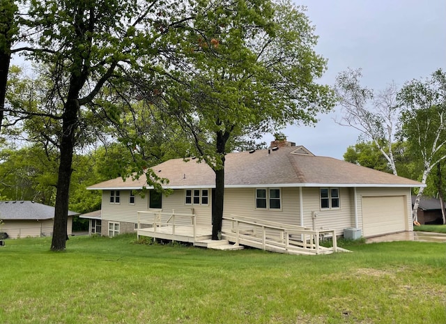 123 Birchridge Dr, Brainerd, MN 56401 - back of house featuring a garage, a lawn, a wooden deck, and a chimney
