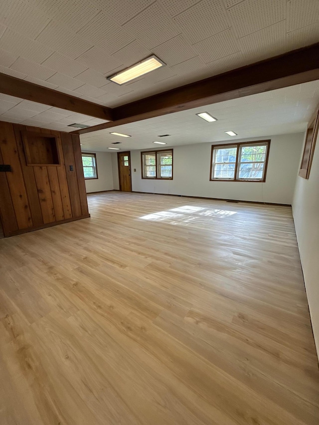 123 Birchridge Dr, Brainerd, MN 56401 - unfurnished room featuring healthy amount of natural light, beamed ceiling, and light wood finished floors