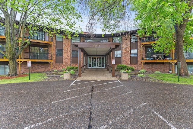 10113 34th St Unit 105, Minnetonka, MN 55305 - view of building exterior with uncovered parking