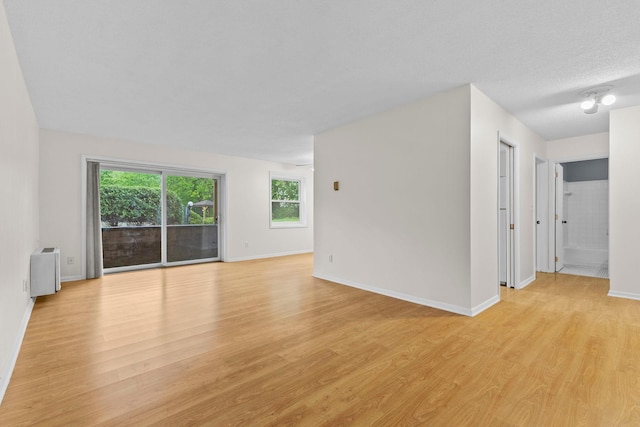 10113 34th St Unit 105, Minnetonka, MN 55305 - spare room with light wood finished floors and baseboards
