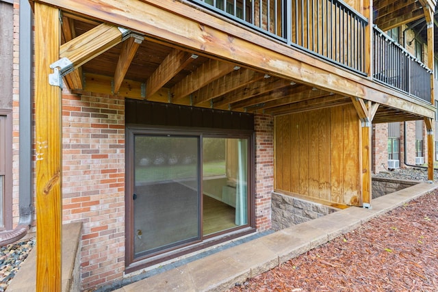 10113 34th St Unit 105, Minnetonka, MN 55305 - property entrance with brick siding and a balcony