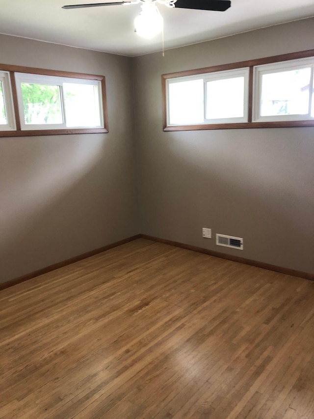 1304 13th Ave N, Moorhead, MN 56560 - unfurnished room with ceiling fan, baseboards, and plenty of natural light