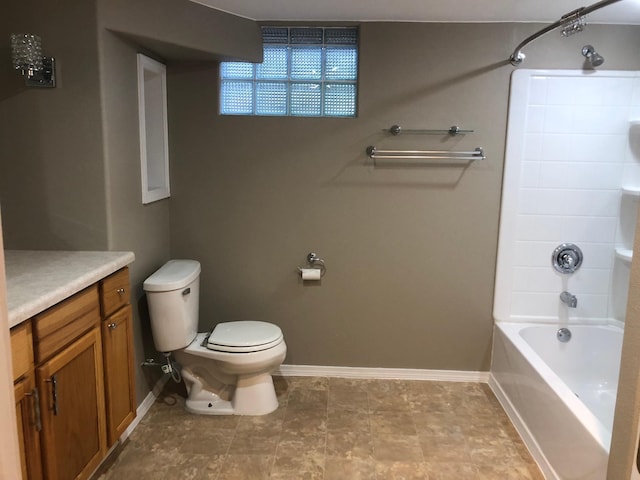 1304 13th Ave N, Moorhead, MN 56560 - full bath with toilet, vanity, baseboards, and shower / washtub combination