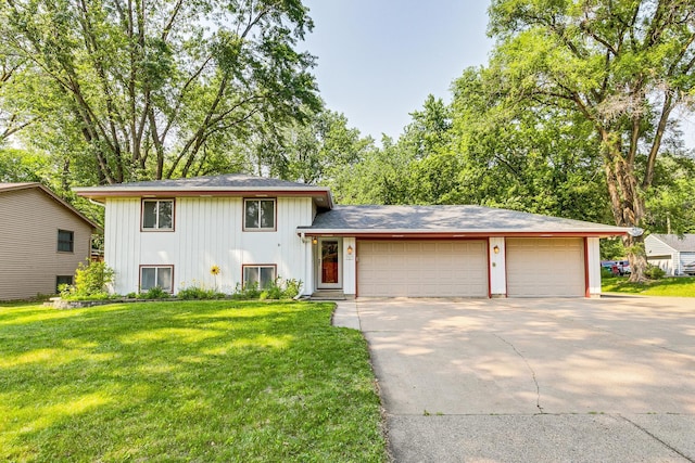 1357 64th Ave NE, Fridley, MN 55432 - tri-level home with driveway, an attached garage, a front lawn, board and batten siding, and a shingled roof