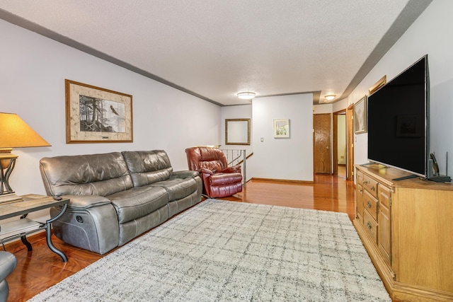 1357 64th Ave NE, Fridley, MN 55432 - living room with a textured ceiling and light wood-type flooring