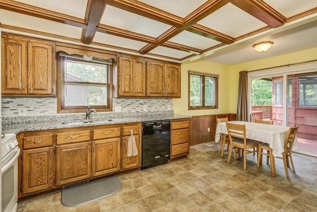1357 64th Ave NE, Fridley, MN 55432 - kitchen with black dishwasher, gas range gas stove, coffered ceiling, brown cabinetry, and light stone countertops