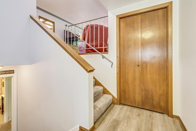 1357 64th Ave NE, Fridley, MN 55432 - staircase featuring wood finished floors