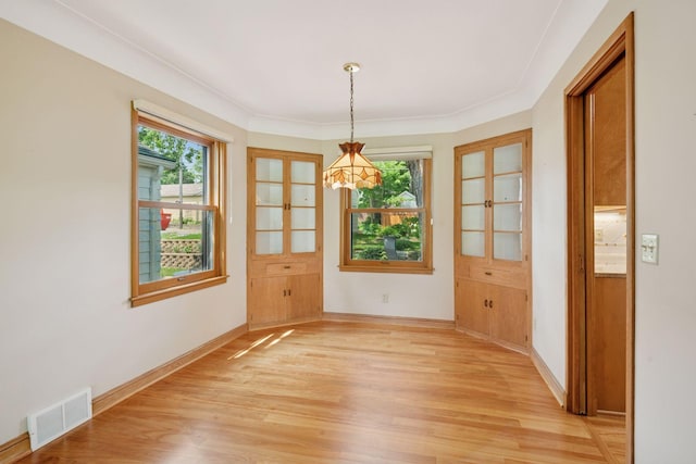 4932 Cedar Ave S, Minneapolis, MN 55417 - unfurnished dining area with plenty of natural light and light wood-style floors