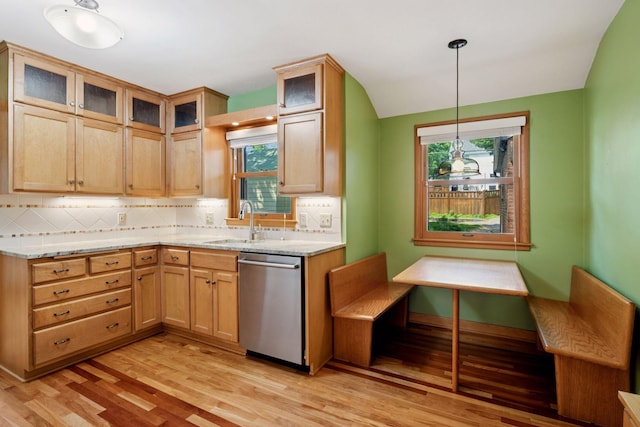 4932 Cedar Ave S, Minneapolis, MN 55417 - kitchen with dishwasher, backsplash, light wood-style flooring, and healthy amount of natural light