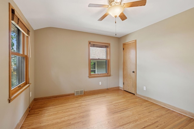 4932 Cedar Ave S, Minneapolis, MN 55417 - empty room with plenty of natural light, light wood-type flooring, a ceiling fan, and lofted ceiling