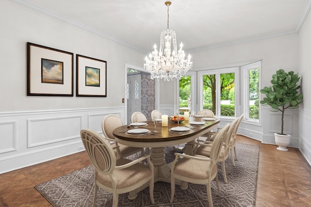 2645 Arcola Ln, Minnetonka Beach, MN 55391 - dining area with plenty of natural light, a decorative wall, ornamental molding, a chandelier, and wainscoting