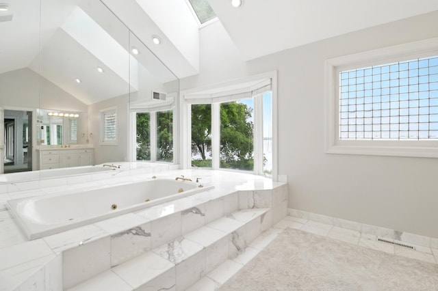 2645 Arcola Ln, Minnetonka Beach, MN 55391 - full bathroom with lofted ceiling, vanity, a tub with jets, recessed lighting, and marble finish floors