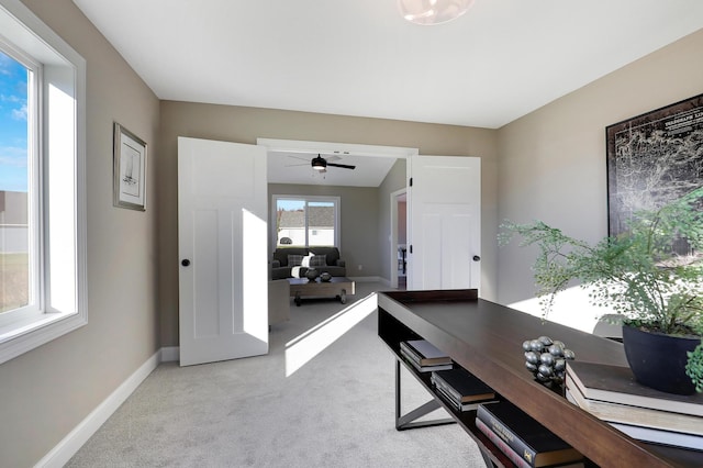 10014 177th Ave NW, Elk River, MN 55330 - carpeted home office featuring baseboards and a ceiling fan
