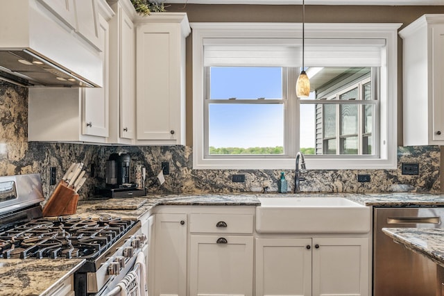26042 Sunset Dr, Chisago City, MN 55013 - kitchen with appliances with stainless steel finishes, exhaust hood, a sink, and white cabinets