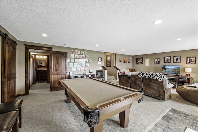 26042 Sunset Dr, Chisago City, MN 55013 - rec room with a textured ceiling, recessed lighting, billiards table, a barn door, and light carpet